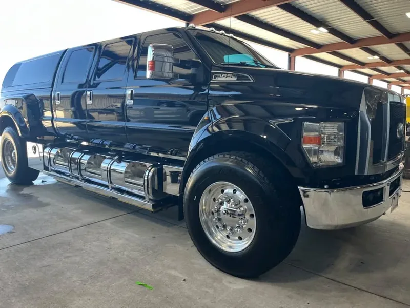 Black Ford F-650 crew cab washed and rinsed at the customer yard
